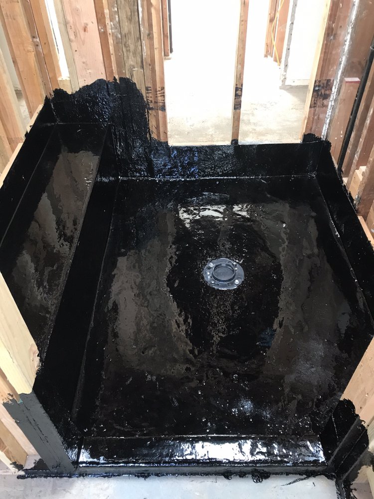 Slide of The Hot Mop Specialists