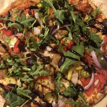 Blaze Pizza - Sausage, red onion, roasted reds, jalapeños, banana peppers, arugula, balsamic glaze, roasted garlic. - Pizza Near Me - Dewitt, New York Blaze Pizza - Sausage, red onion, roasted reds, jalapeños, banana peppers, arugula, balsamic glaze, roasted garlic. - Pizza Near Me - Dewitt, New York