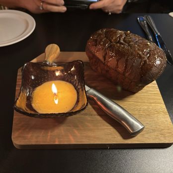 Wine And Whiskey Bistro - Bread with butter candle. - Whiskey Bars Near Me - Castle Rock, Washington Wine And Whiskey Bistro - Bread with butter candle. - Whiskey Bars Near Me - Castle Rock, Washington