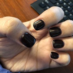 Ten20 Nail Studio - Horrible. Notice the chipping top coat on my pointer finger. My nails just look like blobs.