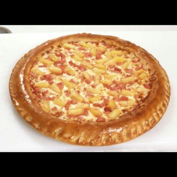 Pizza Pro - a cheese pizza on a white plate - Pizza Near Me - Bathurst, New Brunswick
