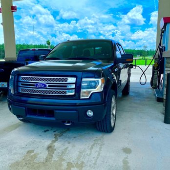 RaceTrac - a blue truck at a gas station - Gas Stations Near Me - Daytona Beach, Florida RaceTrac - a blue truck at a gas station - Gas Stations Near Me - Daytona Beach, Florida