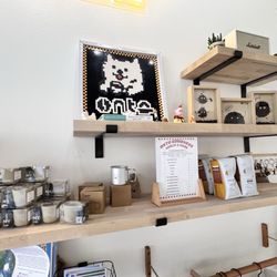 Onto Coffee - Merch wall