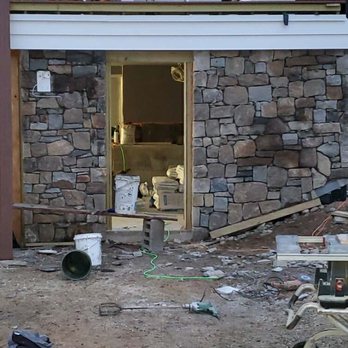 Doherty Customs - the back of a house being built - Roofing Near Me