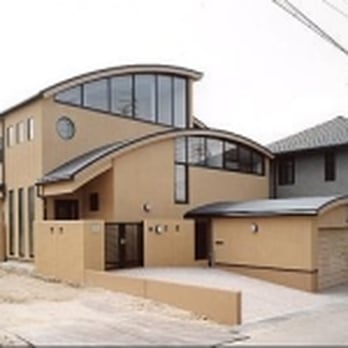 Trend Construction - a house with a curved roof - General Contractors Near Me - Edison, New Jersey Trend Construction - a house with a curved roof - General Contractors Near Me - Edison, New Jersey