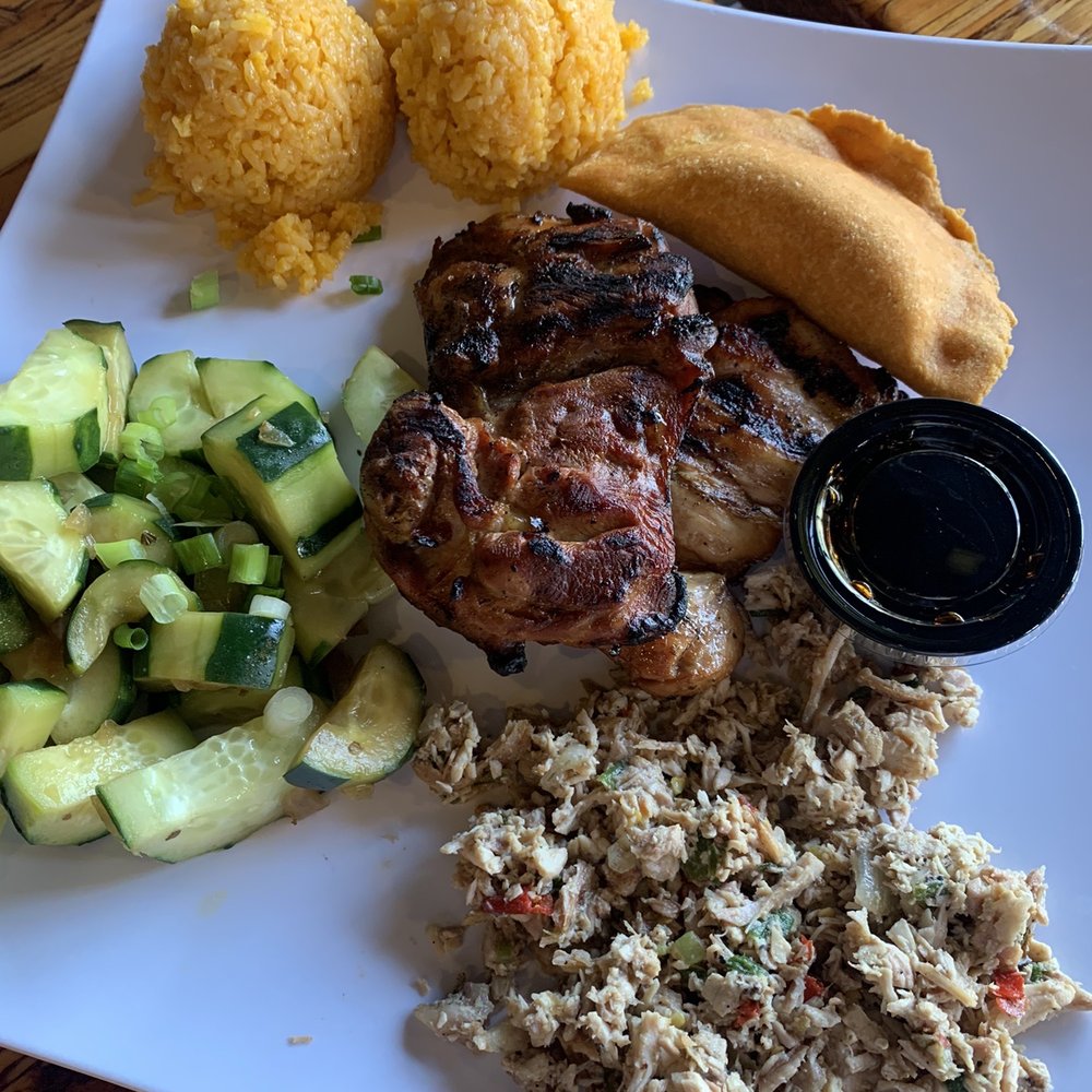 Guahan Grill - The Guahan plate with kelaguen and cucumber salad and empanadas, red rice and finadene. - Barbeque Near Me - Oceanside, California