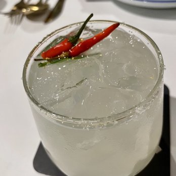 Kin Dee - Tom Yum cocktail. usually comes with a floating thai chili, but they'll crack it for you to add extra spice - Thai Near Me - Houston, Texas Kin Dee - Tom Yum cocktail. usually comes with a floating thai chili, but they'll crack it for you to add extra spice - Thai Near Me - Houston, Texas