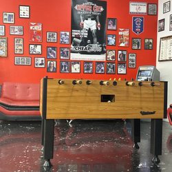 Uppercut Barbershop - While waiting, you can play... or cash out on ATM machine.