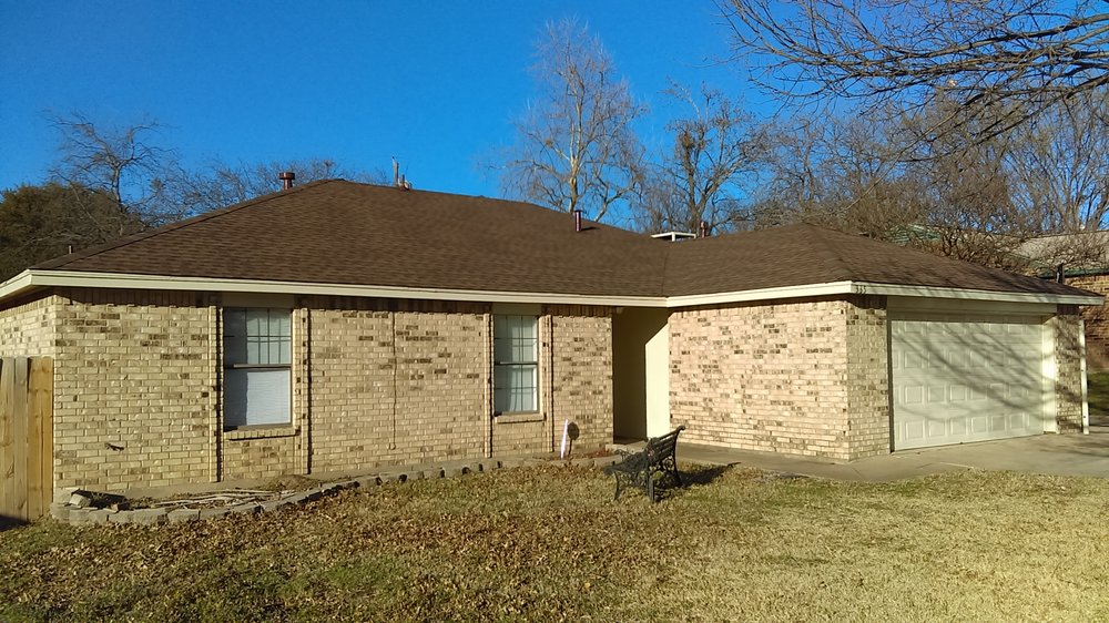 Slide of Reveles Roofing