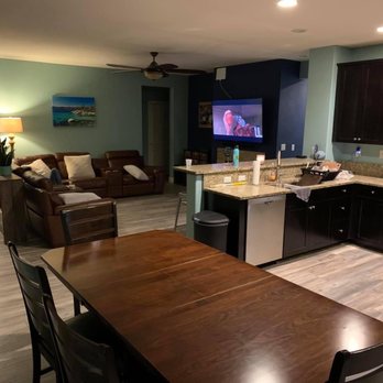 Quality Floors 4 Less - So much better with the laminate! White tile in entryway and kitchen/dining with beige carpet no more! - Flooring Near Me - Reno, Nevada
