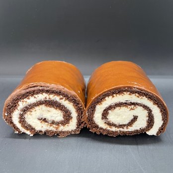 Zucchini Kill - Rebel Swrrrl - our swiss rolls that were named by the one and only Kathleen Hanna from the band, Bikini Kill - Desserts Near Me - Austin, Texas