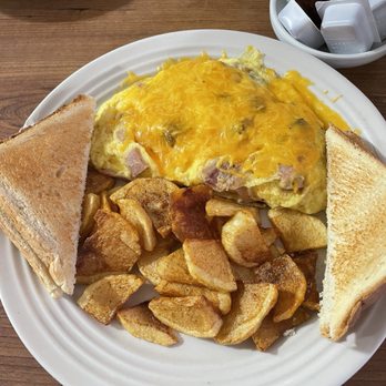 The Broken Egg Cafe - Three meat omelette with potatoes - Breakfast & Brunch Near Me - San Antonio, Texas