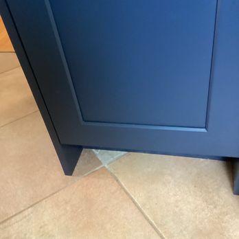 The Ivy Builders - Exposed tile used to level cabinet - General Contractors Near Me - Los Angeles, California