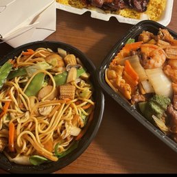 Pictured right: S8 "Triple Delight." Pictured Left: .47 "Vegetable Lo Mein" (Pt.) Pictured Top: A .7 "Teriyaki Chicken w/ pork rice" Pictured right: S8 "Triple Delight." Pictured Left: .47 "Vegetable Lo Mein" (Pt.) Pictured Top: A .7 "Teriyaki Chicken w/ pork rice"