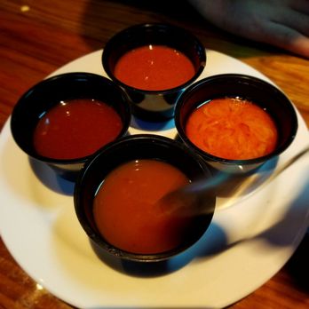 Miller's Ale House - Sampling of sauces for the Zinger. - Sports Bars Near Me - Aurora, Illinois
