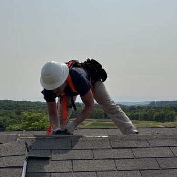 Eclipse Construction - Action shot of a ridge vent removal - Roofing Near Me - Morgantown, West Virginia Eclipse Construction - Action shot of a ridge vent removal - Roofing Near Me - Morgantown, West Virginia
