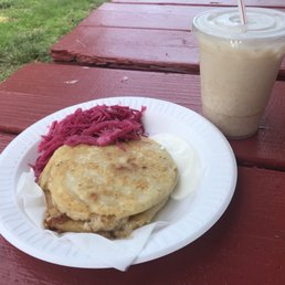 Pork and cheese pupusa and horchata Pork and cheese pupusa and horchata