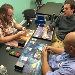 Paper or Plastic Sports and Games - Playing Magic the Gathering. Great place to play!