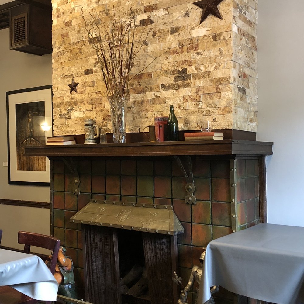 Jester's Court Pub & Eatery - Fireplace in main dining area. - Pubs Near Me - Port Perry, Ontario Jester's Court Pub & Eatery - Fireplace in main dining area. - Pubs Near Me - Port Perry, Ontario