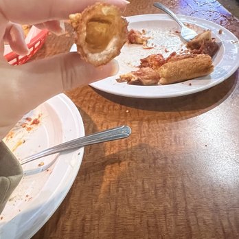 Pizzaman Dan's - One out of my six hollow mozzarella sticks. - Pizza Near Me - Camarillo, California Pizzaman Dan's - One out of my six hollow mozzarella sticks. - Pizza Near Me - Camarillo, California