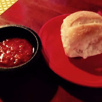 Ola Restaurant - Instead of chips n'salsa, Warm Latin roll with a. Delicious red chimichurri! - Latin American Near Me - Orange, Connecticut