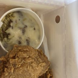 Chicken and dirty rice with Cajun gravy.