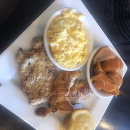 Grilled chicken breast, yams, corn muffin, and macaroni. Grilled chicken breast, yams, corn muffin, and macaroni.
