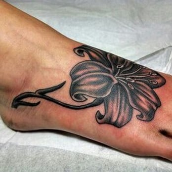 Farsyde Tattoo & Piercing - Side view of my daughter's gorgeous lily created by Felix. - Tattoo Near Me - Lihue, Hawaii
