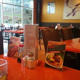 Dirty tables, and no excuse. The place is empty. Dirty tables, and no excuse. The place is empty.