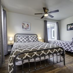 Briar Laine House - Pig room on the 2nd floor of The Flynn with 1 queen and 1 twin bed.  Attached bath