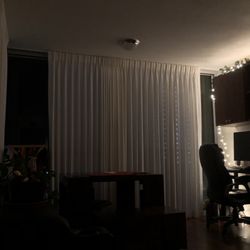 Jimmy's Drapery and  Vertical Shop - Angel White, floor to ceiling curtains.