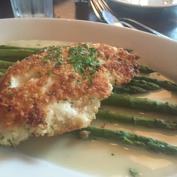 Wildfire - Parmesan white fish with a lemony sauce on a bed of roasted asparagus - Steakhouses Near Me - McLean, Virginia