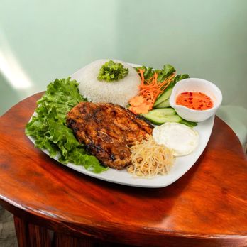 Saigon Restaurant - Traditional Combo Rice Plate - Vietnamese Near Me - Worcester, Massachusetts Saigon Restaurant - Traditional Combo Rice Plate - Vietnamese Near Me - Worcester, Massachusetts