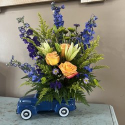 Enchanted Cottage - Ford truck with fresh flowers or succulents are perfect for the man in your life.