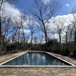 John Joseph Custom Pools & Masonry - 49'x20' salt water pool with 8'x20' sundeck. Stadium walk in steps after sundeck 20' wide. Excited for the pavers to go in!