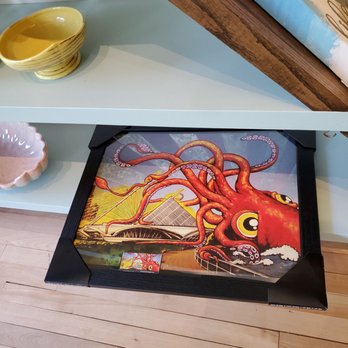 Arts At Large - a painting of an octopus on a shelf - Cafes Near Me - Milwaukee, Wisconsin