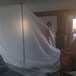 Living room masking to avoid dust during repairs Living room masking to avoid dust during repairs
