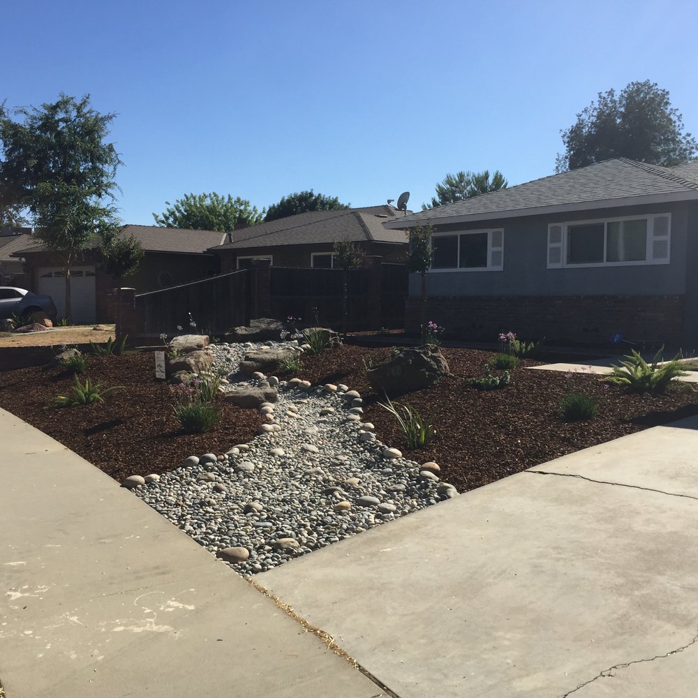 Leonard's Landscaping - finished product: drip system installed, bark and trees and plants were placed. - Gardeners Near Me Leonard's Landscaping - finished product: drip system installed, bark and trees and plants were placed. - Gardeners Near Me