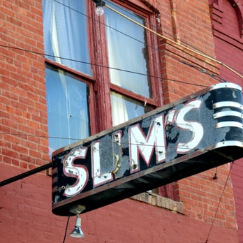 Slim's Tavern - a neon sign for slim's - Bars Near Me - Lind, Washington