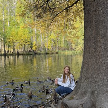 June Lake Loop - My Granddaughter at the pond behind Silver Lake Resort feeding the ducks. - Local Flavor Near Me