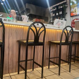 a row of bar stools a row of bar stools