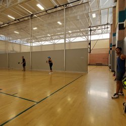 Iron Horse Community Gym - A view of the divider screen between section 2 and 3.  Sign up board is in right foreground.