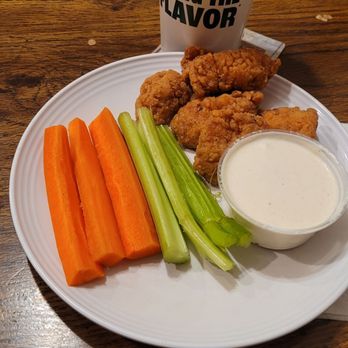 Wingstop - Vegies and blue cheese and bite-sized morsels of lemon pepper...Southern style sweet tea is great. - Chicken Wings Near Me - Westminster, California