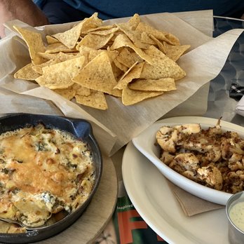 The Wolf Cafe - Kale and artichoke dip (left) and baked cauliflower (right) - Coffee & Tea Near Me - Ballwin, Missouri