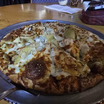 Tide Pool Pub & Pool - Garlic Lovers Pizza, covered with artichokes & dried tomatoes underneath. So good! Photo does not do it justice. - Bars Near Me - Depoe Bay, Oregon Tide Pool Pub & Pool - Garlic Lovers Pizza, covered with artichokes & dried tomatoes underneath. So good! Photo does not do it justice. - Bars Near Me - Depoe Bay, Oregon