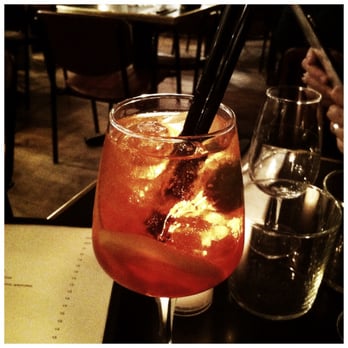 Luisa Maria - And now for something completely different...a classic Aperol Spritz served with an OLIVE! Bizarre but it works. Oh yes it does. - Italian Near Me - Paris, 75