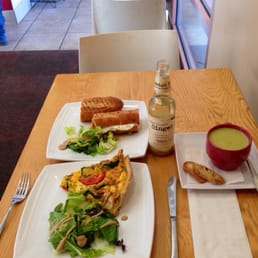 The three cheese sandwich, ginger ale, cauliflower soup, and garden vegetable quiche.