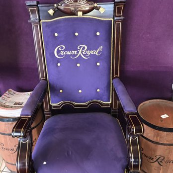 Duty Free Americas - a purple chair with a crown on it - Beer, Wine & Spirits Near Me - Port Huron, Michigan
