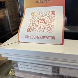 Theo's Pizzeria & Grill - Credit surcharge, prohibited by Massachusetts state law.