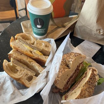 Uncommon Grounds - Sausage egg cheese on cheddar parm bagel and the flying pig on everything bagel - Coffee & Tea Near Me - Clifton Park, New York Uncommon Grounds - Sausage egg cheese on cheddar parm bagel and the flying pig on everything bagel - Coffee & Tea Near Me - Clifton Park, New York